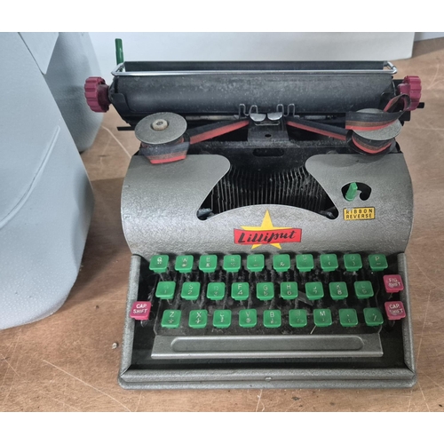 139 - Old Lilliput typewriter and a camping toilet (2)