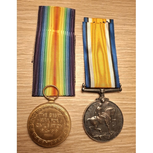 157 - Boxed WWI medal pair presented to 141228 Gnr. R.W. Dunger. R.A.