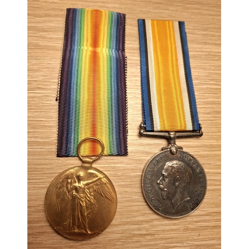 157 - Boxed WWI medal pair presented to 141228 Gnr. R.W. Dunger. R.A.