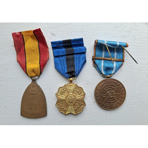 173 - Three Belgium medals, WWI commemorative medal, Belgium L'Union Fait La Force Medal and a Belgium UN ... 