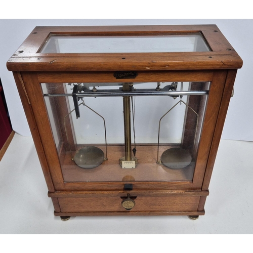 212 - Mid 20thC industrial weighing scales in fine quality mahogany and glass case by John Nesbitt of Manc... 