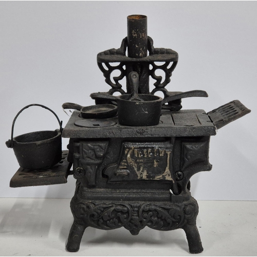 217 - Antique cast iron miniature stove