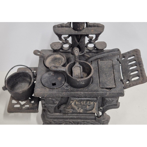 217 - Antique cast iron miniature stove