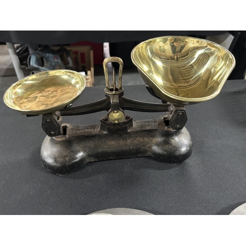 221 - Antique cast iron and bross shop scales together with 2 antique pewter plates, tankard and an old or... 