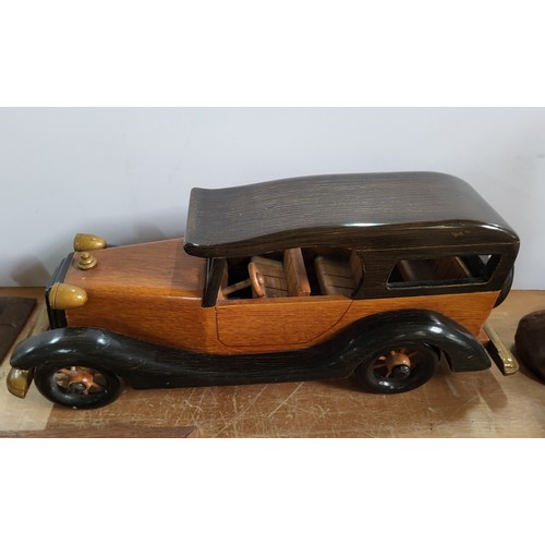 256 - Collection of various Treen items inluding a nicely carved face, a car and an inkwell with elephants... 