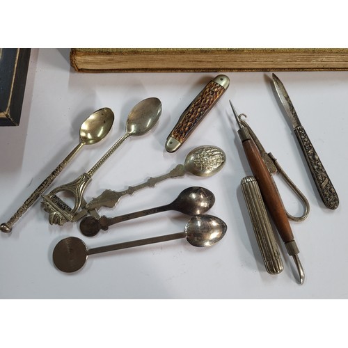 262 - Coranation souvenir book along with a ollectionnovelty spoons including a silver pen knife and other... 