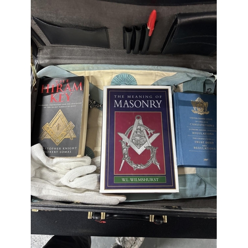 270 - Briefcase with masonry books and Apron