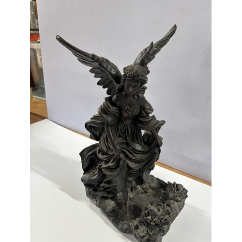 277 - Resin Figure of a seated Angel