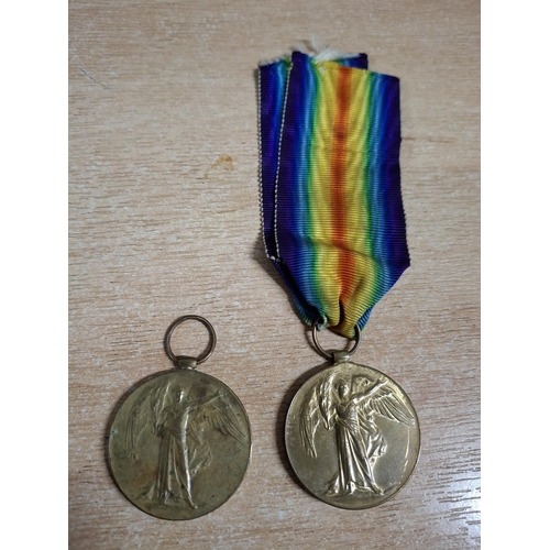 303 - Two WWI British Victory  medals, one to 18239 Pte F.C.P Botha, 1st S.A.I, the other to C-11015 Pte E... 