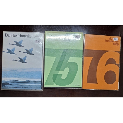 316 - Three Denmark annual stamp packs, 1975, 1976 and 1986 (3)