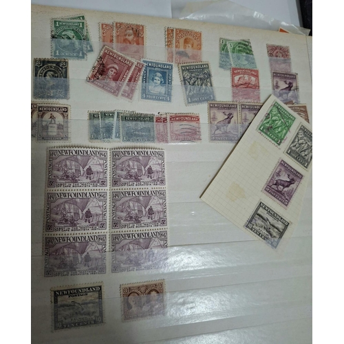 323 - Three albums containing a good collection of world and Commonwealth 20thC stamps, Hong Kong, Holland... 