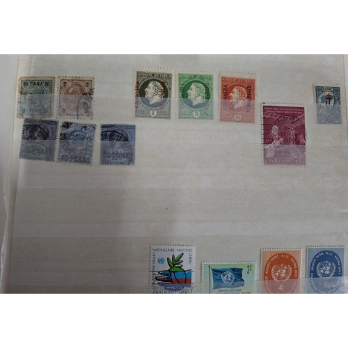 323 - Three albums containing a good collection of world and Commonwealth 20thC stamps, Hong Kong, Holland... 