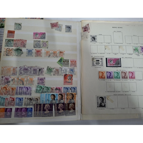 323 - Three albums containing a good collection of world and Commonwealth 20thC stamps, Hong Kong, Holland... 