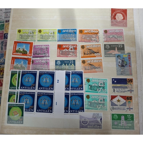 323 - Three albums containing a good collection of world and Commonwealth 20thC stamps, Hong Kong, Holland... 