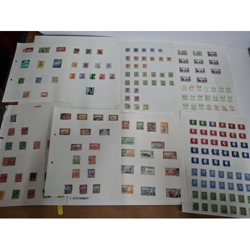 324 - Huge quantity of unexamined dealer sheets from world stamps including a selection of Southern Rhodes... 