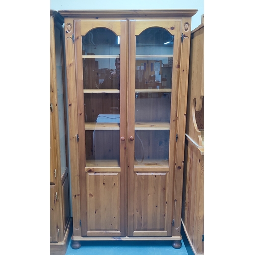 456 - Fine quality Pine display cabinet with inner glass shelves, possibly Ducal