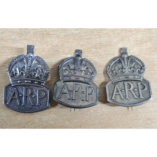 115 - Three 1938 original hallmarked silver A.R.P badges produced by the Royal Mint, marked J.C for Sir Jo... 