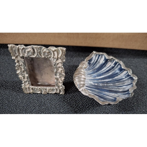 23 - Hallmarked antique silver butter rest in the form of a shell together with an antique .800 silver co... 