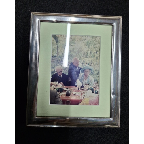 24 - Large modern plain Italian silver photo frame containing a photo of the late queen mother which was ... 