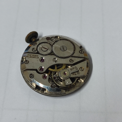 51A - A 15 jewel wristwatch face with hallmarked Gold back and front, approx. 3 grams / 7.1 grams gross