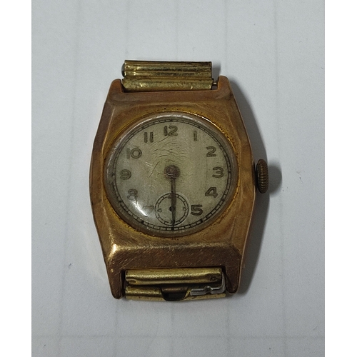 51A - A 15 jewel wristwatch face with hallmarked Gold back and front, approx. 3 grams / 7.1 grams gross