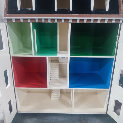 431 - Extra large dolls house in Georgian form,

105 cm tall x 77cm wide x 49cm deep