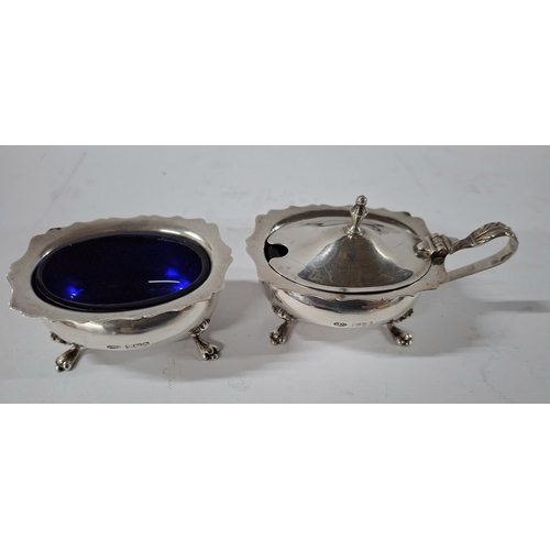 9 - Matching hallmarked Birmingham 1983 silver salt and mustard pot, both with blue glass liners (2),

T... 