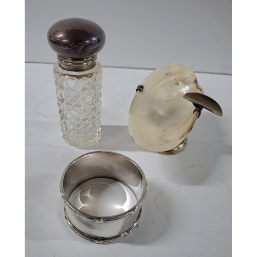 10 - Hallmarked silver napkin ring together with a silver and shell ash-tray and a small silver topped bo... 