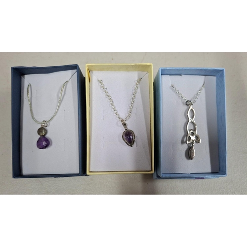 12 - Three silver necklaces' with pendants, all in presentation boxes (3)