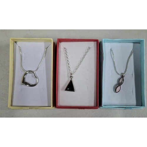 13 - Three silver necklaces, all with different pendants and all in presentation boxes (3)