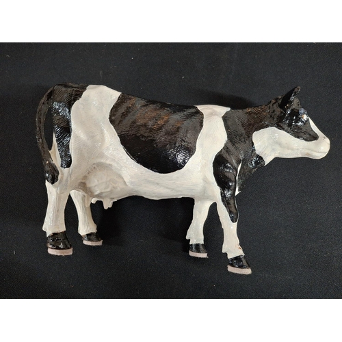 69 - Old cast iron Cow, previously butchers shop window display,

Been painted in recent years in the col... 