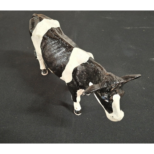 69 - Old cast iron Cow, previously butchers shop window display,

Been painted in recent years in the col... 