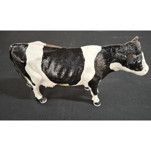 69 - Old cast iron Cow, previously butchers shop window display,

Been painted in recent years in the col... 