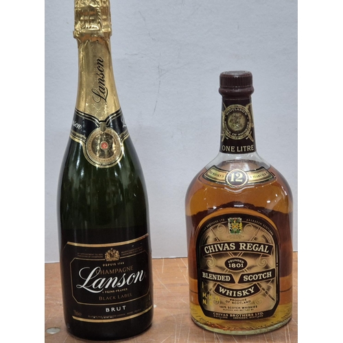 80 - Unopened bottle 75cl of Lanson Champagne together with an unopened 1 litre bottle of 12 year old Chi... 