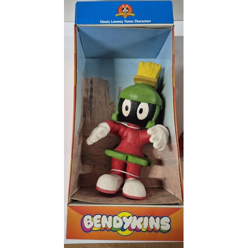 84 - Boxed Bendykins figure together with an earlier tin plate toy with later plastic Duck attached (2)