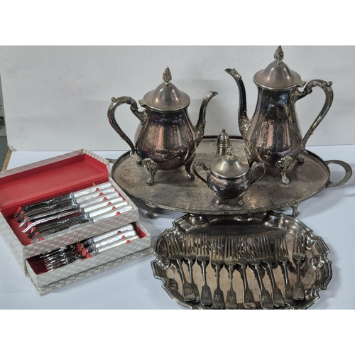 85 - Silver plated tea and water pot etc together with two plated serving trays, antique forks and a set ... 