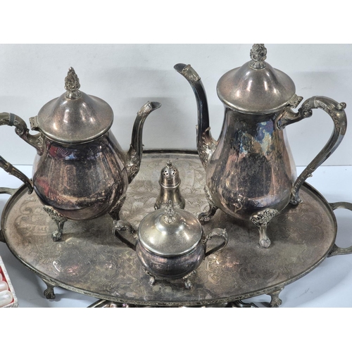 85 - Silver plated tea and water pot etc together with two plated serving trays, antique forks and a set ... 