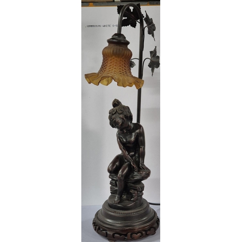 90 - Fine quality metal table lamp with a seated boy