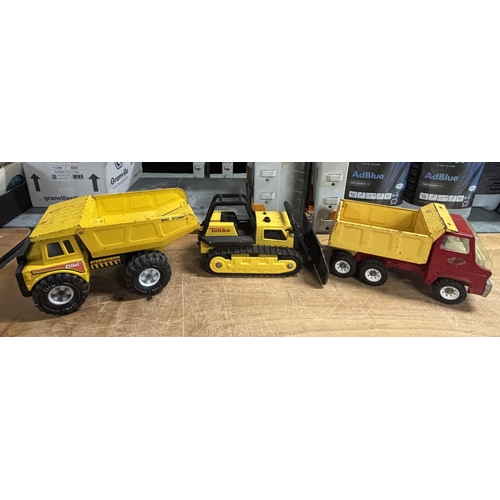 91 - 3 Large metal vehicles 2 are Tonka