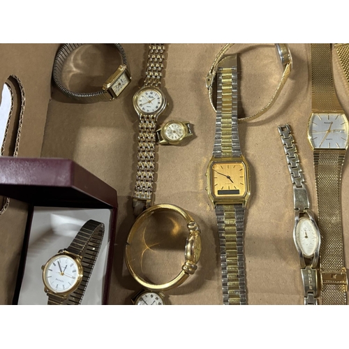 27 - Box containing gold coloured watches including Accurist and Pulsar