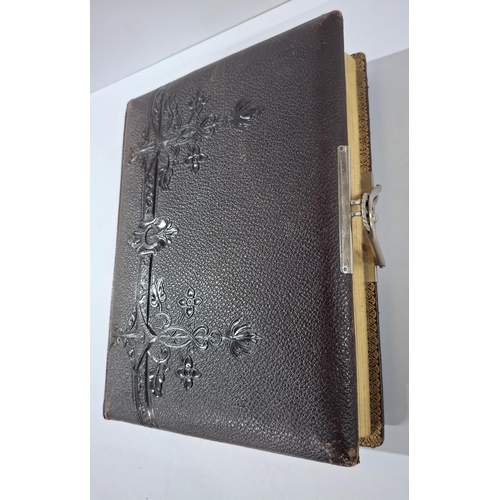 107 - Never used! Edwardian photograph album with tooled leather outer, chome metal clasp and many pages w... 