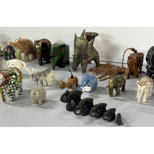 144 - A large collection of elephant ornaments