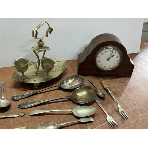 151 - Mantle clock with metalware including cutlery