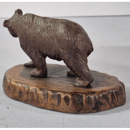 169 - Early/mid 20thC Black Forest Bear on wood plinth