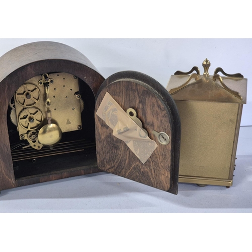 178 - Cased 20thc skeleton mantle clock together with a mid 20thC wooden mantle clock (2)