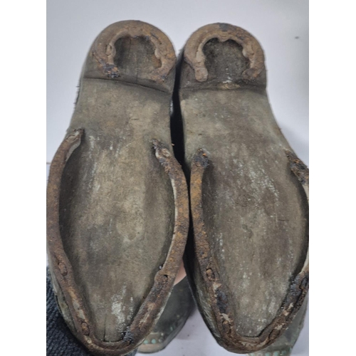 194 - Three pairs of antique clogs (3)