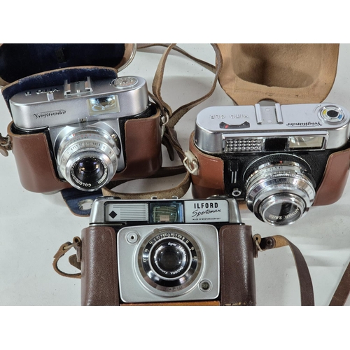 221 - Three vintage cameras to include an Ilford Sportsman and two Voightlander (3)