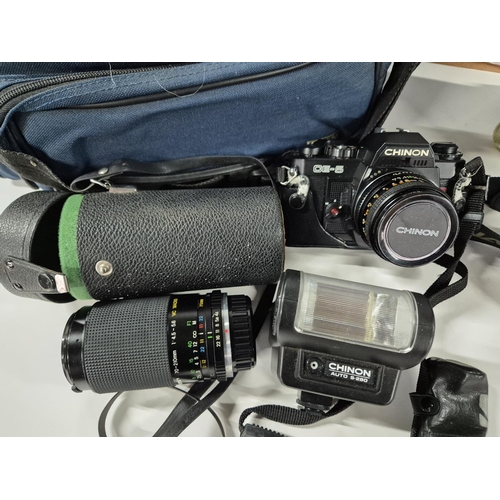 223 - Minolta 404si with camera bag together with Chinon CE-5 with lense and other accessories, both with ... 