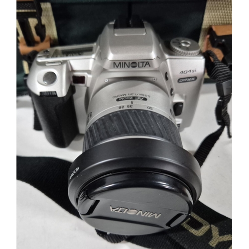 223 - Minolta 404si with camera bag together with Chinon CE-5 with lense and other accessories, both with ... 