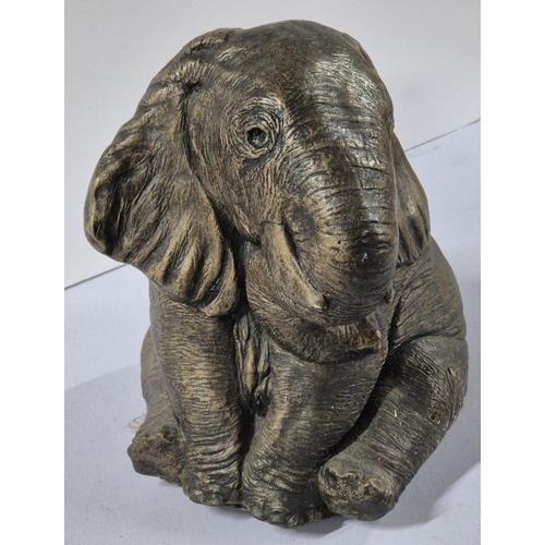 282 - Large seated heavy coated composite Elephant indoor or out-door figurines